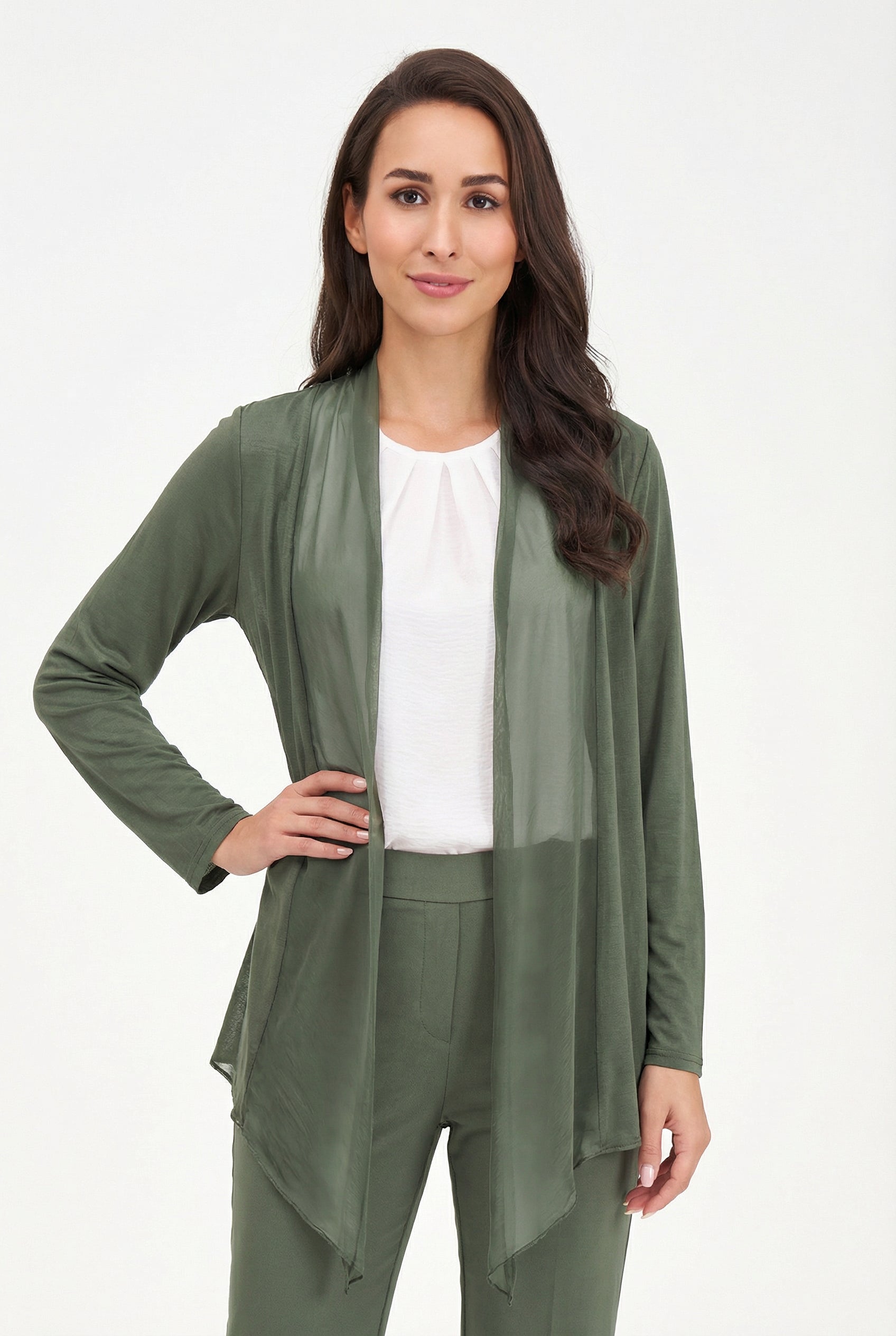 Woman wearing a green outfit with a white background